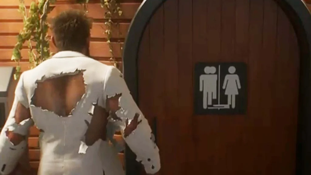 Das viral diskutierte Toilettenschild in Marvel's Wolverine mit fehlerhaft &uuml;berlagerten Piktogrammen