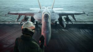 ACE COMBAT 8: WINGS OF THEVE – offizielles Launch-Motiv mit Kampfjet auf dem Flugdeck