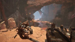 Ein schwer bewaffneter Fahrer auf einem Crawler feuert in einer felsigen Schlucht von Canyons.